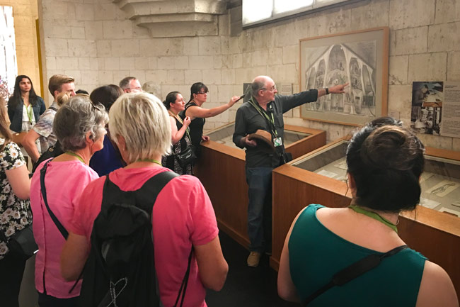 A Guide inside the interior of the Museum of the Sagrada Familia